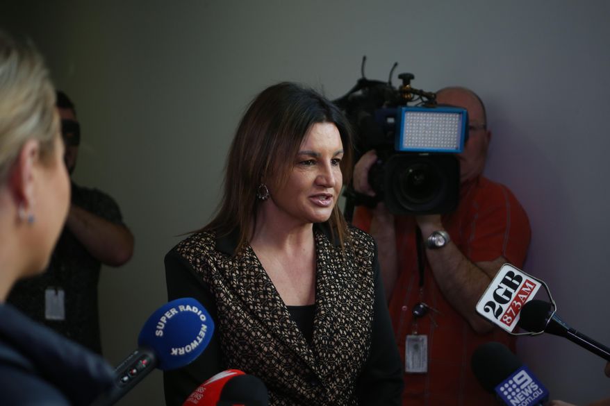 Sen. Jacqui Lambie addresses reporters in Parliament House in Canberra, Australia, on Monday, Sept. 9, 2019. The unaligned senator says she will support laws that would force the jobless to undergo drug tests in return for welfare checks if lawmakers are also subjected to illicit drug screening.(AP Photo/Rod McGuirk)