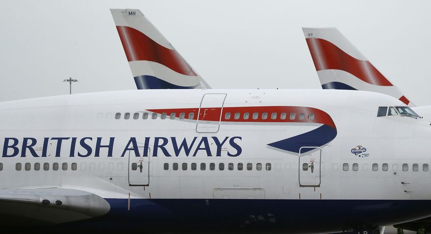 In this Jan. 10, 2017, file photo, British Airways planes are parked at Heathrow Airport in London. British Airways says in a statement Monday, Sept. 9, 2019, it has had to cancel almost all flights as a result of a pilots' 48-hour strike over pay. (AP Photo/Frank Augstein, File)