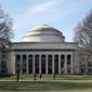 FILE - In this April 3, 2017 file photo, students walk past the &amp;quot;Great Dome&amp;quot; atop Building 10 on the Massachusetts Institute of Technology campus in Cambridge, Mass. MIT said Media Lab director Joi Ito resigned Saturday, Sept. 7, 2019, after reports he had a more extensive fundraising relationship with disgraced financier Jeffrey Epstein than previously acknowledged. (AP Photo/Charles Krupa, File)