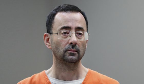 FILE - In this Nov. 22, 2017, file photo, Larry Nassar, 54, appears in court for a plea hearing in Lansing, Mich. The government&#39;s $4.5 million fine against Michigan State University in the Nassar sexual assault scandal is unprecedented. The U.S. Education Department has extraordinary leverage over schools that participate in federal student aid programs. (AP Photo/Paul Sancya, File)
