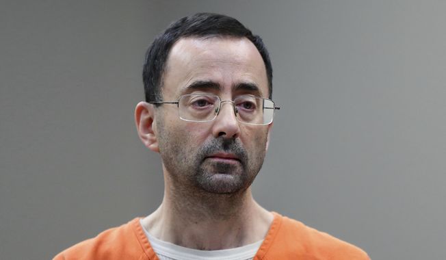 FILE - In this Nov. 22, 2017, file photo, Larry Nassar, 54, appears in court for a plea hearing in Lansing, Mich. The government&#x27;s $4.5 million fine against Michigan State University in the Nassar sexual assault scandal is unprecedented. The U.S. Education Department has extraordinary leverage over schools that participate in federal student aid programs. (AP Photo/Paul Sancya, File)