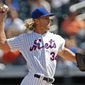 New York Mets starting pitcher Noah Syndergaard (34) winds up during the first inning of a baseball game against the Philadelphia Phillies, Sunday, Sept. 8, 2019, in New York. (AP Photo/Kathy Willens)