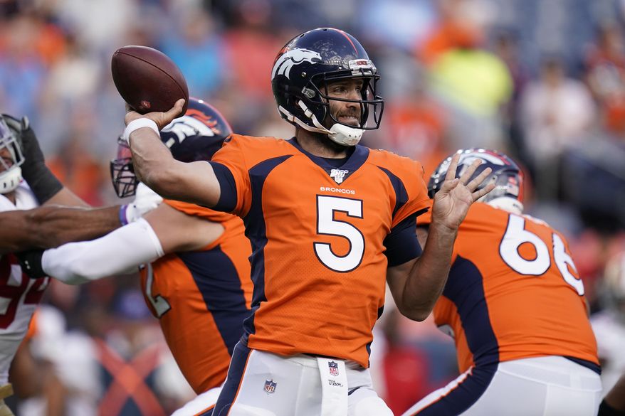 FILE - In this Aug. 19, 2019, file photo, Denver Broncos quarterback Joe Flacco (5) throws a pass against the San Francisco 49ers during an NFL preseason football game in Denver. More than ever NFL teams are choosing protection over preparation when it comes to their quarterback’s workload in the preseason. The Broncos and Raiders, who cap off the NFL’s opening weekend Monday night, are two examples. Oakland’s Derek Carr took just six snaps and threw two passes in the preseason and Denver’s new quarterback, Joe Flacco, directed just four series in the preseason. (AP Photo/Jack Dempsey, File)
