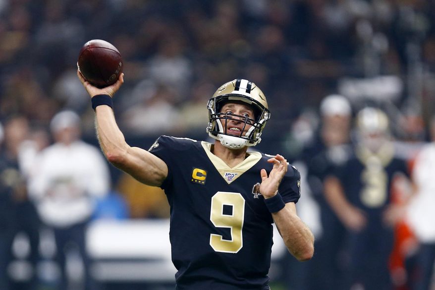 New Orleans Saints quarterback Drew Brees (9) passes in the first half of an NFL football game against the Houston Texans in New Orleans, Monday, Sept. 9, 2019. (AP Photo/Butch Dill)