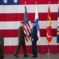 Then-Joint Chiefs of Staff Gen. Joseph F. Dunford Jr., left, shakes hands with Gen. John W. Raymond, the commander of the U.S. Space Command, Sept. 9, 2019, during a ceremony to recognize the establishment of the United States Space Command at Peterson Air Force Base in Colorado Springs, Colo.  (Christian Murdock/The Gazette via AP) ** FILE **