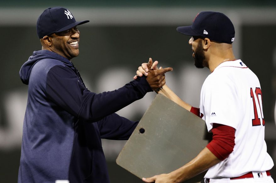 Boston Red Sox's David Price (10) greets New York Yankees' CC Sabathia during a ceremony to honor Sabathia before a baseball game in Boston, Sunday, Sept. 8, 2019. (AP Photo/Michael Dwyer)