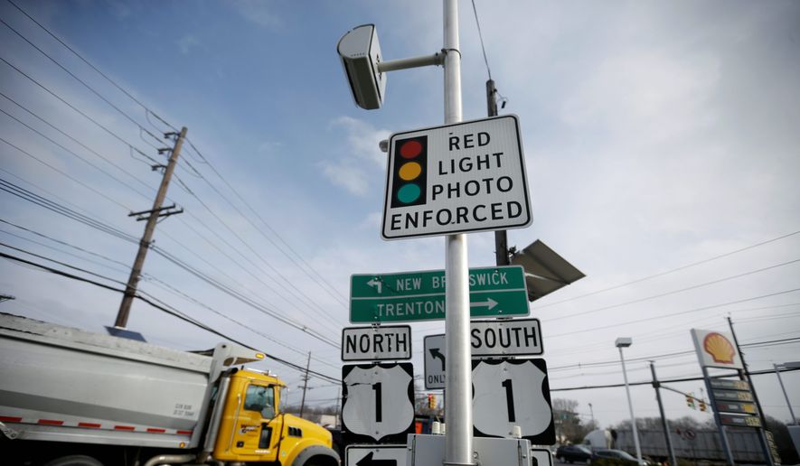 According to data from the National Coalition of State Legislatures, red-light cameras are used in 23 states and the District of Columbia for traffic enforcement. At least 11 states have banned them after expressing dissatisfaction over their effectiveness. (ASSOCIATED PRESS)