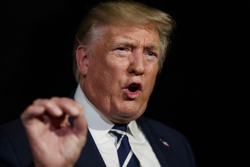 In this Aug. 23, 2019, photo, President Donald Trump speaks with reporters as he walks to Marine One on the South Lawn of the White House, in Washington. (AP Photo/Alex Brandon) **FILE**