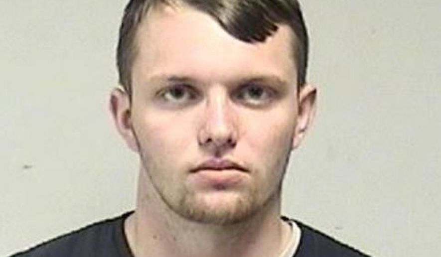 In this photo provided by the Kenosha County Sheriff's Office, Tyler Huffhines is pictured in a booking photo. Huffhines is accused of manufacturing thousands of counterfeit vaping cartridges a day with THC oil for almost two years, running the operation with 10 employees, authorities said. (Kenosha County Sheriff's Office via AP)