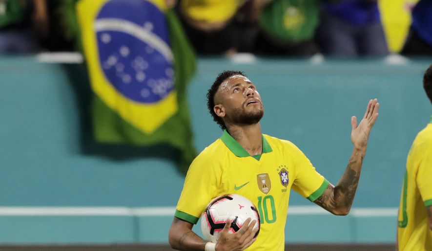 Brazil forward Neymar reacts after scoring a goal during the second half of a friendly soccer match against Colombia, Friday, Sept. 6, 2019, in Miami Gardens, Fla. (AP Photo/Lynne Sladky)