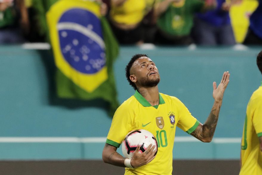Brazil forward Neymar reacts after scoring a goal during the second half of a friendly soccer match against Colombia, Friday, Sept. 6, 2019, in Miami Gardens, Fla. (AP Photo/Lynne Sladky)