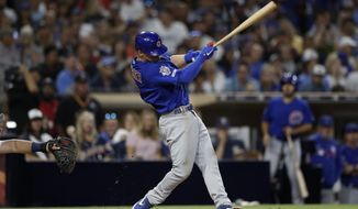 Chicago Cubs&#39; Nico Hoerner hits a two-RBI triple during the fifth inning of a baseball game against the San Diego Padres Monday, Sept. 9, 2019, in San Diego. (AP Photo/Gregory Bull)