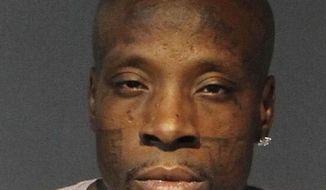 Terry Williams, a member of the Compton Crips in Los Angeles, is pictured in this booking photo taken Tuesday, Sept. 10, 2019 at the Washoe County Jail in Reno, Nevada after he was arrested on a fugitive warrant following a standoff with a SWAT team in neighboring Sparks. Federal agents had been looking for him since May when he walked away from a halfway house in Las Vegas. (AP Photo/Washoe County Sheriff&#39;s Office)