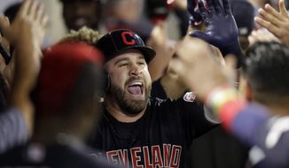 Cleveland Indians&#39; Jason Kipnis celebrates in the dugout after a two-run home run against the Los Angeles Angels during the second inning of a baseball game in Anaheim, Calif., Monday, Sept. 9, 2019. (AP Photo/Chris Carlson)