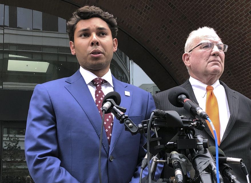FILE — In this Friday, Sept. 6, 2019 file photo Fall River Mayor Jasiel Correia, left, speaks beside his attorney Kevin Reddington outside the federal courthouse, in Boston, after his appearance on bribery, extortion and fraud charges. Correia pleaded not guilty. Fall River City Council President Cliff Ponte on Monday, Sept. 9, 2019 asked Correia to step down. (AP Photo/Philip Marcelo, File)