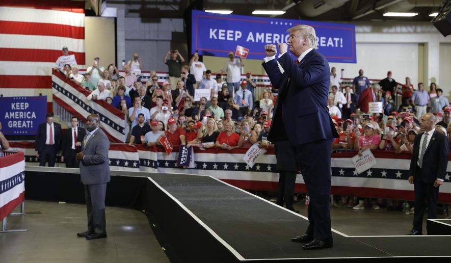 President Donald Trump speaks during a campaign rally at the Crown Expo, Monday, Sept. 9, 2019, in Fayetteville, N.C. (AP Photo/Evan Vucci)