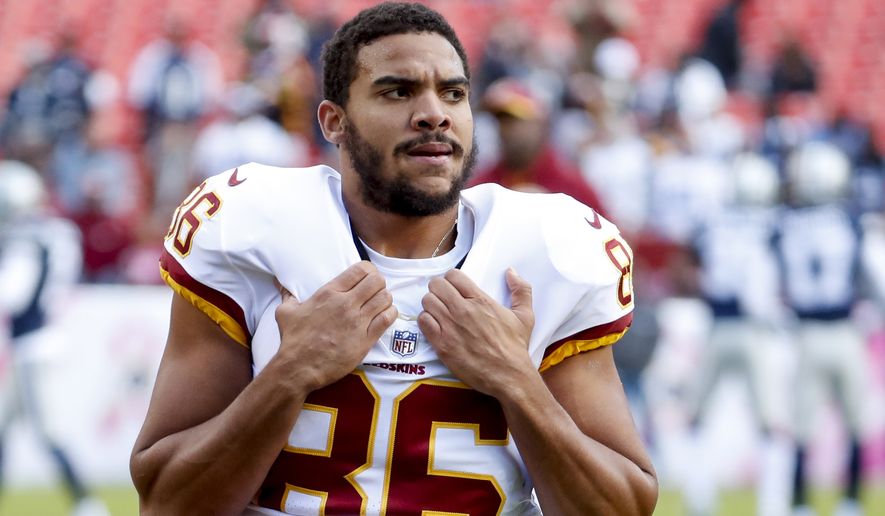  In this Oct. 21, 2018, file photo, Washington Redskins tight end Jordan Reed (86), warm up before an NFL football game against the Dallas Cowboys, in Landover, Md. Reed is expected to make his season debut for the Redskins on Sunday, Sept. 15, 2019, after recovering from what’s believed to be his fifth documented concussion in the NFL and seventh dating back to college. Concussions continue to be a concern for Reed, whose value to the Redskins might be as high as any player they have.(AP Photo/Andrew Harnik, File) **FILE**