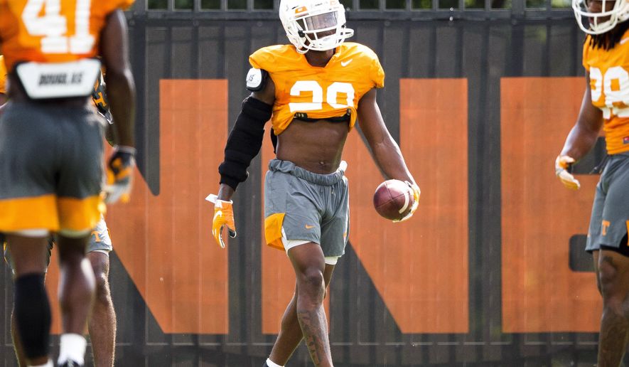 Tennessee defensive back Bryce Thompson (20) participates in an NCAA college football practice Wednesday, Sept. 11, 2019 in Knoxville, Tenn. Tennessee cornerback Bryce Thompson has been cleared to return to practice less than three weeks after his arrest on a misdemeanor domestic assault charge. (Brianna Paciorka/Knoxville News Sentinel via AP)