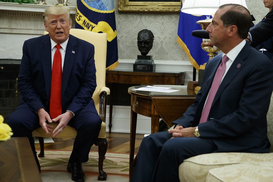 Secretary of Health and Human Services Alex Azar looks on as President Donald Trump talks about a plan to ban most flavored e-cigarettes, in the Oval Office of the White House, Wednesday, Sept. 11, 2019, in Washington. (AP Photo/Evan Vucci)