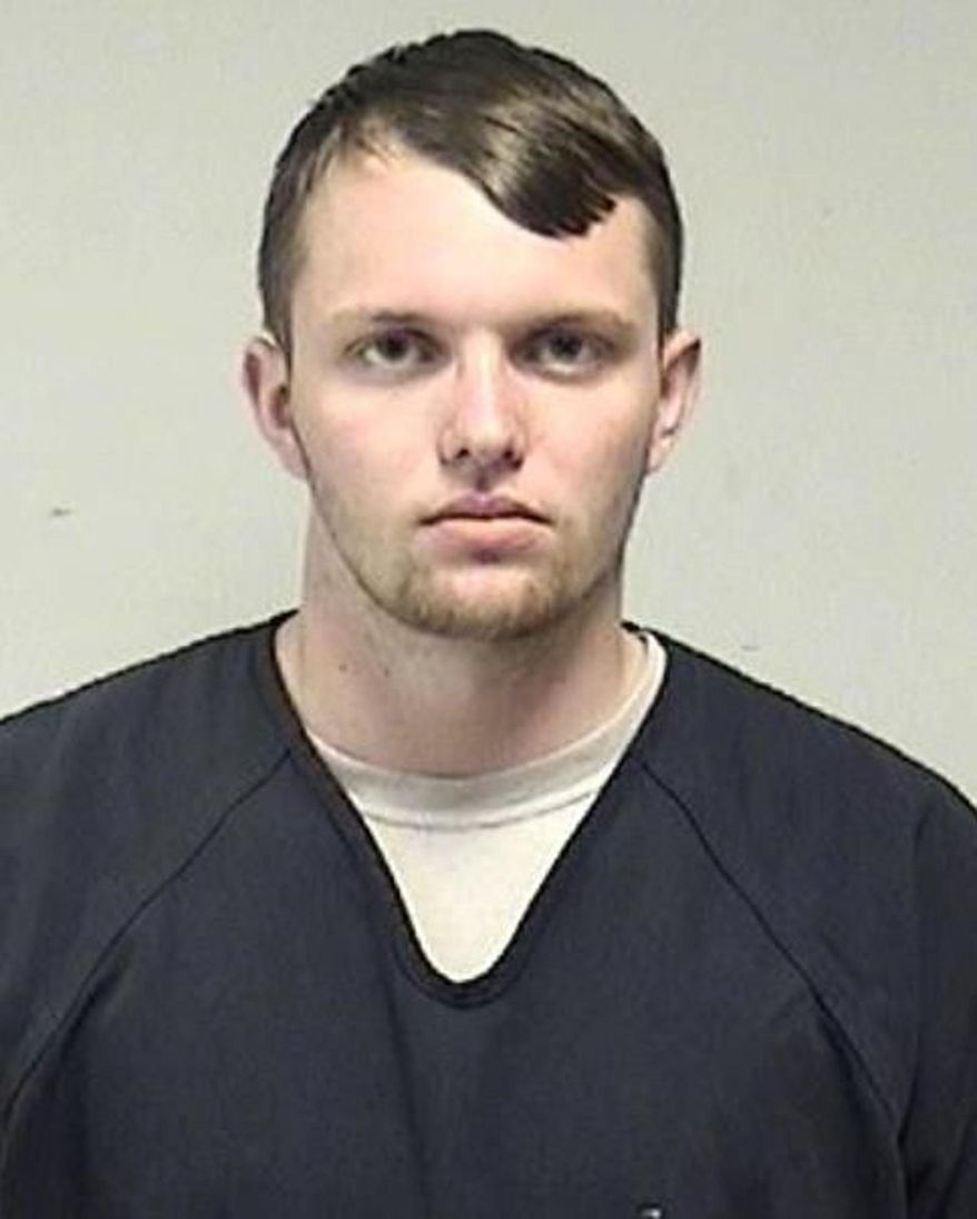 In this photo provided by the Kenosha County Sheriff's Office, Tyler Huffhines is pictured in a booking photo. Huffhines is accused of manufacturing thousands of counterfeit vaping cartridges a day with THC oil for almost two years, running the operation with 10 employees, authorities said. (Kenosha County Sheriff's Office via AP)