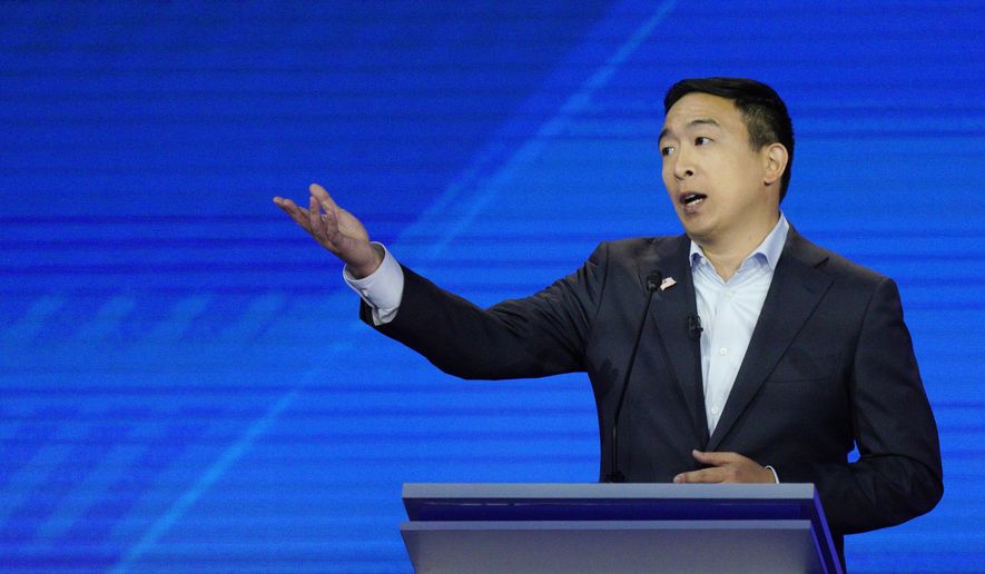 Democratic presidential candidate entrepreneur Andrew Yang gives his closing statement Thursday, Sept. 12, 2019, during a Democratic presidential primary debate hosted by ABC at Texas Southern University in Houston. (AP Photo/David J. Phillip)