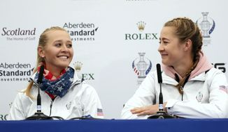 Sisters Jessica and Nelly Korda of the US during a press conference at Gleneagles, Auchterarder, Scotland, Thursday, Sept. 12, 2019. The Solheim cup runs from 13-15 Sept. (AP Photo/Peter Morrison)
