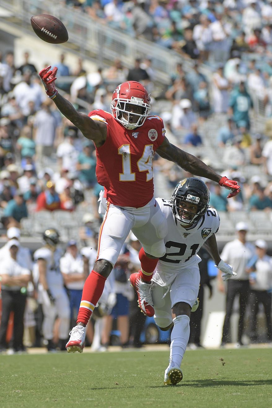 Kansas City Chiefs wide receiver Sammy Watkins (14) cannot hang on to a pass as Jacksonville Jaguars cornerback A.J. Bouye (21) defends during the first half of an NFL football game Sunday, Sept. 8, 2019, in Jacksonville, Fla. (AP Photo/Phelan M. Ebenhack)