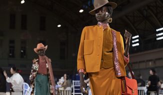 The Marc Jacobs collection is modeled during Fashion Week, Wednesday, Sept. 11, 2019, in New York. (AP Photo/Mary Altaffer)