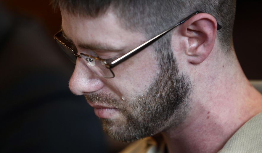 John Williams sheds a tear during his sentencing hearing Thursday, Sept. 12, 2019, in Portland, Maine, for the April 25, 2018 killing of Somerset County Cpl. Eugene Cole. Williams was sentenced to life in prison.  (AP Photo/Robert F. Bukaty)