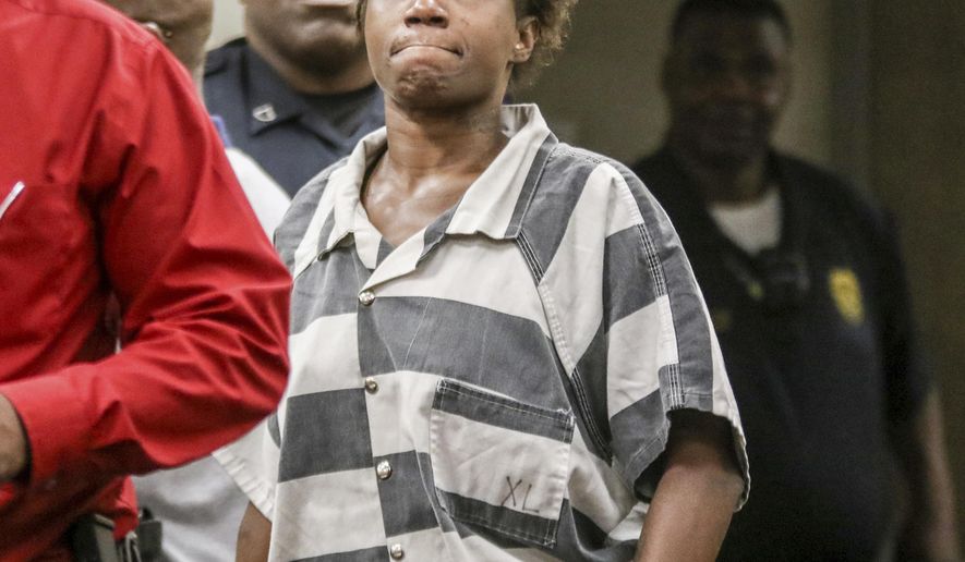 Celeste Louise Smith, 35, of Meridian, Miss., appears in Meridian Municipal Court on Thursday, Sept. 12, 2019 in Meridian, Miss. Smith was charged with capital murder and two counts of child neglect following the discovery of the body of a child at a city residence. Police believe the body is 5-year-old Jakie Toole, a child with special needs who was last seen in April but was reported missing on Sept. 4, 2019 according to Meridian Police Chief Benny Dubose. (Paula Merritt/The Meridian Star via AP)