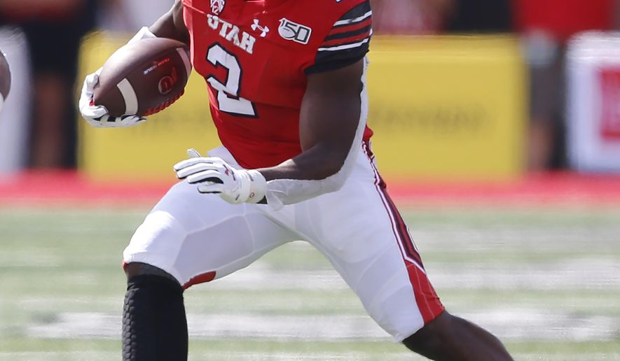 Utah running back Zack Moss (2) carries the ball against Northern Illinois in the first half of an NCAA college football game Saturday, Sept. 9, 2019, Salt Lake City. (AP Photo/Rick Bowmer)