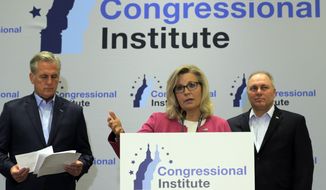 Rep. Liz Cheney, R-Wyo., accompanied by House Minority Leader Kevin McCarthy R-Calif., and Rep. Steve Scalise, R-La., speaks on a news conference at the 2019 House Republican Conference Member Retreat in Baltimore, Friday, Sept. 13, 2019. (AP Photo/Jose Luis Magana)