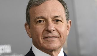 FILE - In this Monday, March 13, 2017, file photo, Walt Disney Co. CEO Robert Iger attends a special screening of Disney&#39;s &amp;quot;Beauty and the Beast&amp;quot; at Alice Tully Hall, in New York. Walt Disney Co. CEO Robert Iger has stepped down from Apple’s board of directors as the two companies prepare to launch their own video streaming services to compete against market leader Netflix, Friday, Sept. 13, 2019. (Photo by Evan Agostini/Invision/AP, File)
