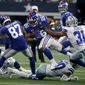 New York Giants&#39; Sterling Shepard (87) helps clear running room for running back Saquon Barkley (26) as Dallas Cowboys cornerback Byron Jones (31) defends in the second half of a NFL football game in Arlington, Texas, Sunday, Sept. 8, 2019. (AP Photo/Michael Ainsworth)