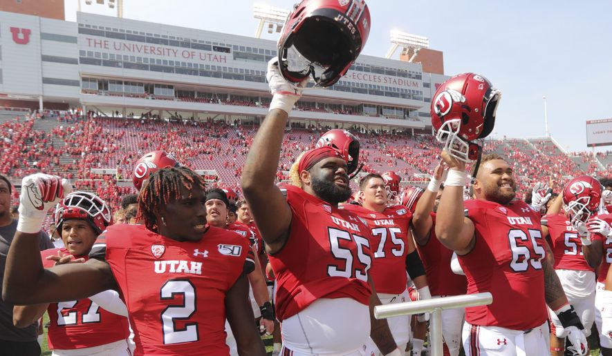 Utah players celebrate their victory over Northern Illinois during an NCAA college football game Saturday, Sept. 9, 2019, Salt Lake City. (AP Photo/Rick Bowmer)