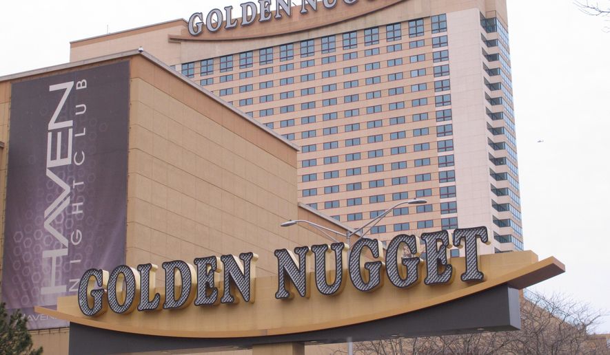 This Feb. 22, 2019 photo shows the exterior of the Golden Nugget casino in Atlantic City N.J. On Friday, Sept. 13, 2019, New Jersey Gov. Phil Murphy signed a bill allowing the casino to accept NBA bets on games that don&#39;t involve the Houston Rockets, a team owned by Golden Nugget owner Tilman Fertitta. (AP Photo/Wayne Parry)