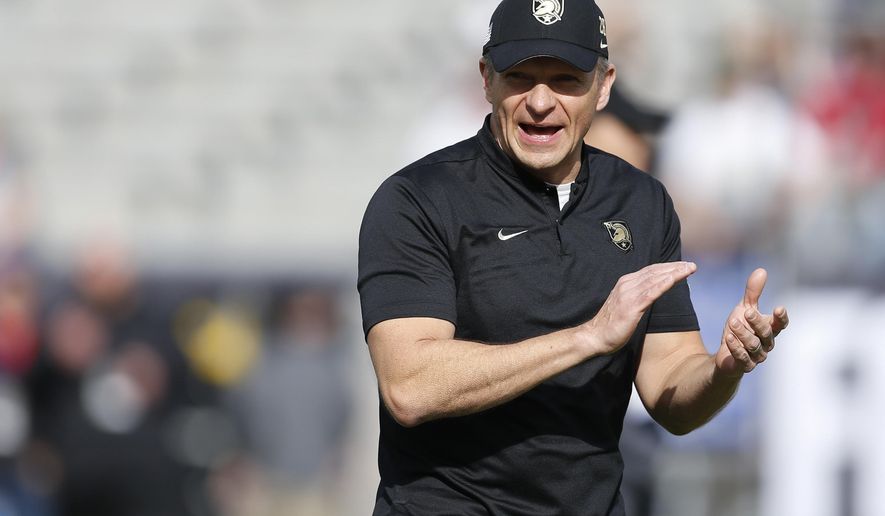 FILE - In this Dec. 22, 2018, file photo, Army head coach Jeff Monken watches as his team warms up before they play Houston in the Armed Forces Bowl NCAA college football game, in Fort Worth, Texas. Army looks to bounce back from a tough overtime loss to Michigan when the Black Knights take on UT-San Antonio, Saturday, Sept. 14, 2019. (AP Photo/Jim Cowsert, File)