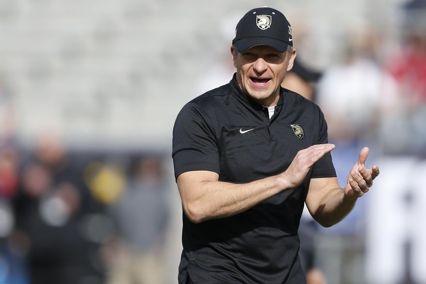 FILE - In this Dec. 22, 2018, file photo, Army head coach Jeff Monken watches as his team warms up before they play Houston in the Armed Forces Bowl NCAA college football game, in Fort Worth, Texas. Army looks to bounce back from a tough overtime loss to Michigan when the Black Knights take on UT-San Antonio, Saturday, Sept. 14, 2019. (AP Photo/Jim Cowsert, File)