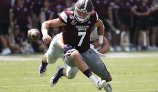 Mississippi State quarterback Tommy Stevens (7) tries to recover his fumble against Kansas State during the first half of their NCAA college football game in Starkville, Miss., Saturday, Sept. 14, 2019. (AP Photo/Rogelio V. Solis)