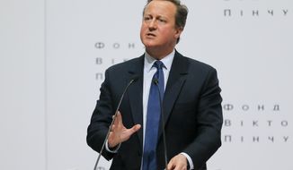 FILE - In this Wednesday, March 29, 2017 file photo Britain&#39;s former Prime Minister David Cameron gestures as he delivers a public lecture &amp;quot;Ukraine&#39;s Place in a changing world&amp;quot; at the Institute of International Relations of the National University in Kiev, Ukraine. David Cameron said in an interview published Saturday that he thinks about the consequences of the Brexit referendum “every single day” and worries “desperately” about what will happen next. (AP Photo/Efrem Lukatsky,file)