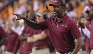Florida State coach Willie Taggart reacts to a call during the second half of an ACC college football game against Virginia in Charlottesville, Va., Saturday, Sept. 14, 2019. (AP Photo/Andrew Shurtleff)
