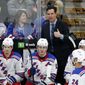 FILE - In this Jan. 19, 2019, file photo, New York Rangers coach David Quinn gestures from the bench during the third period of the team&#39;s NHL hockey game against the Boston Bruins in Boston. The Rangers head into their first practice of training camp with the belief they are ready to take the next step in the second year under Quinn. (AP Photo/Mary Schwalm, File)
