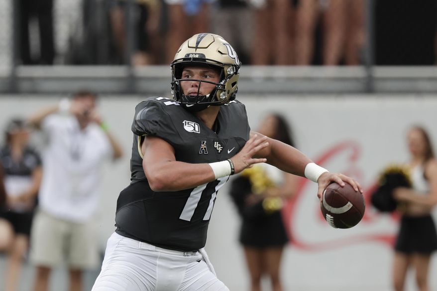 Central Florida quarterback Dillon Gabriel throws a pass against Stanford during the first half of an NCAA college football game, Saturday, Sept. 14, 2019, in Orlando, Fla. (AP Photo/John Raoux)