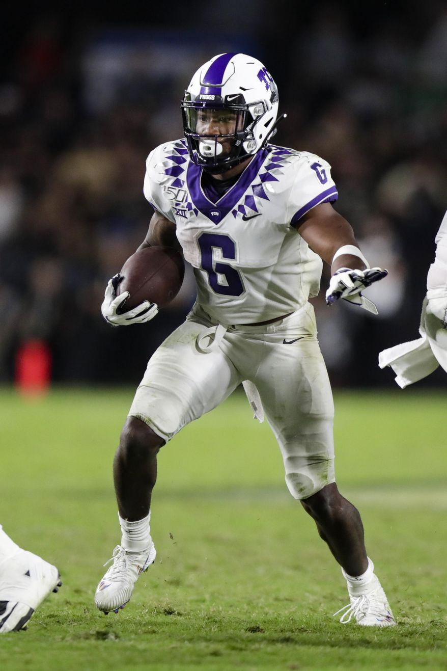 TCU running back Darius Anderson runs against Purdue during the second half of an NCAA college football game in West Lafayette, Ind., Saturday, Sept. 14, 2019. (AP Photo/Michael Conroy)