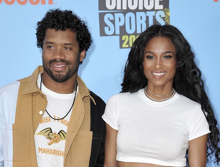CIARA  AND RUSSELL WILSON                                                                                                                                        NFL player Russell Wilson, of the Seattle Seahawks, left, and Ciara arrive at the Kids&#39; Choice Sports Awards on Thursday, July 11, 2019, at the Barker Hangar in Santa Monica, Calif. (Photo by Richard Shotwell/Invision/AP)