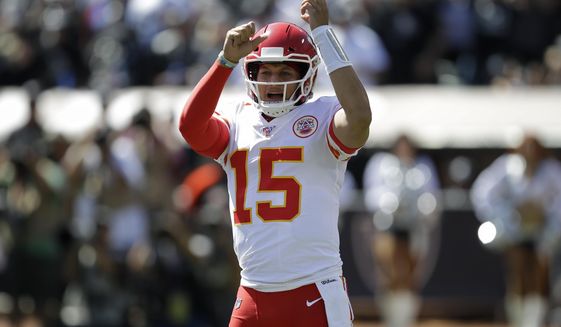 Kansas City Chiefs quarterback Patrick Mahomes (15) yells before a play during the first half of an NFL football game against the Oakland Raiders Sunday, Sept. 15, 2019, in Oakland, Calif. (AP Photo/Ben Margot)
