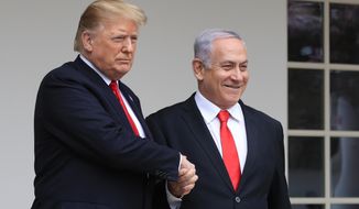 In this March 25, 2019, file photo, President Donald Trump welcomes visiting Israeli Prime Minister Benjamin Netanyahu to the White House in Washington. (AP Photo/Manuel Balce Ceneta, File)