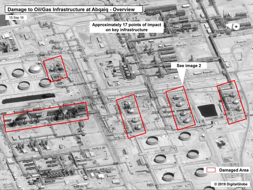 This image provided on Sunday, Sept. 15, 2019, by the U.S. government and DigitalGlobe and annotated by the source, shows damage to the infrastructure at Saudi Aramco's Abaqaiq oil processing facility in Buqyaq, Saudi Arabia. The drone attack Saturday on Saudi Arabia's Abqaiq plant and its Khurais oil field led to the interruption of an estimated 5.7 million barrels of the kingdom's crude oil production per day, equivalent to more than 5% of the world's daily supply. (U.S. government/Digital Globe via AP)