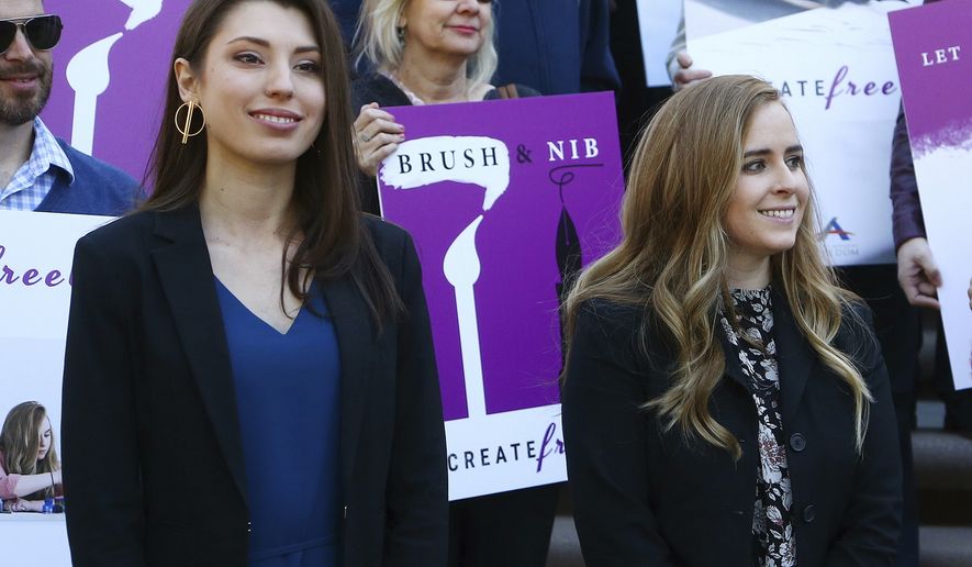 This Jan. 22, 2019, photo shows Christian artists Joanna Duka, front left, and Breanna Koski, front right, outside the Arizona Supreme Court after justices heard arguments over Phoenix&#39;s anti-discrimination ordinance that bars businesses from refusing service to same-sex couples for religious reasons. Duka and Koski, who operate a business that makes invitations and other wedding-related items, had challenged the constitutionality of the ordinance. On Monday, Sept. 16, 2019, the state Supreme Court said the free speech rights of Duka and Koski were violated by the ordinance. (AP Photo/Ross D. Franklin)