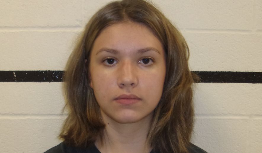 This undated photo provided by the Pittsburg County Sheriff's Office in McAlester, Okla. shows Alexis Wilson. Pittsburg County Sheriff Chris Morris said Wilson was arrested Monday, Sept. 16, 2019, after investigators saw a video of her shooting an AK-47 and her co-workers reported she had said she would "shoot up" the school. (Pittsburg County Sheriff's Office via AP)
